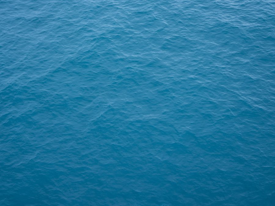 Why we cast water into glass instead of onto it
